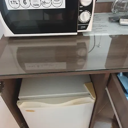 къща